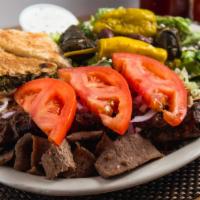 Sampler · Greek salad, 2 dolmas, gyro slices, chicken & beef skewers, onions, tomatoes, spanakopita, t...
