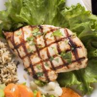 California Chicken · Cilantro-lime grilled chicken with avocado salsa, served with Spanish or wild rice and steam...