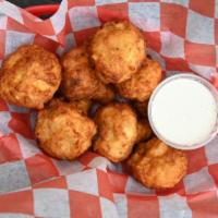 Fried Mushrooms · Hand battered mushrooms, deep-fried to golden perfection and served with jalapeño ranch dres...