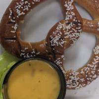 Pretzel And Cheese · Soft, warm pretzel served with queso cheese.
