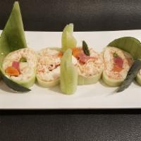 Chef'S Special Roll · Crabmeat, tuna, salmon, white fish, asparagus wrapped in cucumber with ponzu sauce.