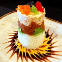 Ahi Tower · Sushi rice, avocado, crabmeat, spicy tuna with 4 kinds tobiko and three kinds sauce.