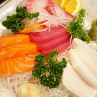 Sashimi Combo · 3 tuna, three salmon, 3 snapper, 3 white fish, 1 shrimp with miso soup.