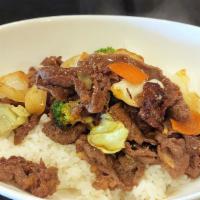 Bulgogi Bowl (Beef) · Rice with thinly sliced tender beef rib eye marinated in Korean style sweet sauce.