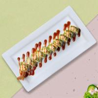 Dragon Rouje Roll · Shrimp tempura, cucumber topped with spicy tuna, crunch, masago, scallion, eel sauce and spi...