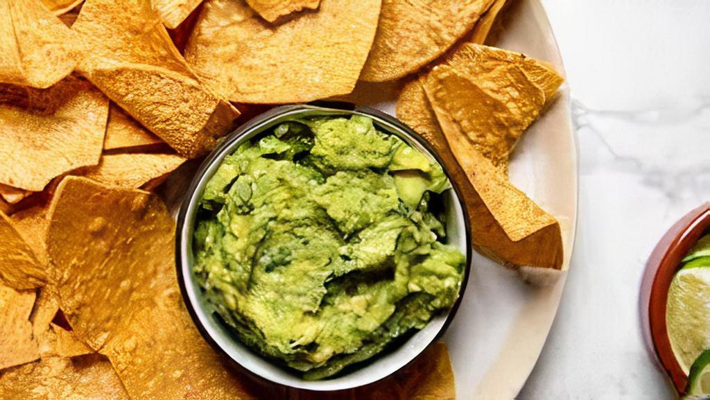 Chips And Guacamole · Truck made Nett Chips served with our guacamole.