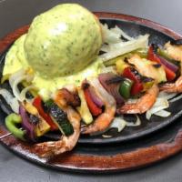 Stuffed Avocado And Shrimp Skewer · Cheese Stuffed Avocado and One Shrimp Skewer containing zucchini, quash and onions. Served w...