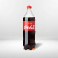 Soda (2 Lts) · Pick from our selection of soda bottles.