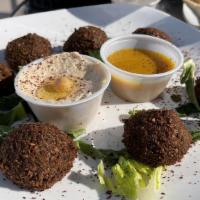 Falafel Appetizer · Chickpea fritters served with tahini sauce.