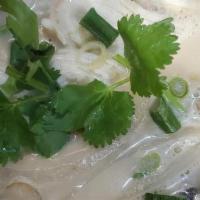 Tom Kha · Coconut milk, mushrooms, tomatoes, cilantro, green onions lemongrass, galangal roots, lime l...
