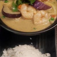Green Curry · Green curry paste in coconut milk, bamboo shoot, peas, carrots, eggplant, bell pepper and ba...
