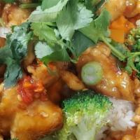 Orange Chicken Rice Bowl · Crispy chicken in our house-made orange sauce on top of steam broccoli and carrot over rice.