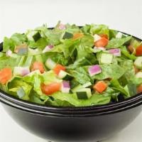 House Salad · Green leaf lettuce, diced tomatoes, cucumbers & onions, served with balsamic dressing.