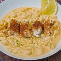 Maine Girl · Cajun lobster over rich creamy mac & cheese. Old bay style with sliced lemon garnish and sha...