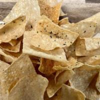Tortilla Chips  · Fried in house