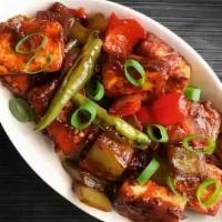 Chilli Paneer · Marinated paneer tossed into a spicy tangy sauce with peppers and onions.