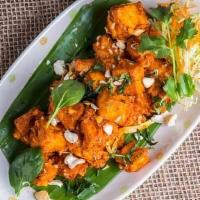 Paneer 555 · Fried paneer cooked with special sauce made with cashew nuts.