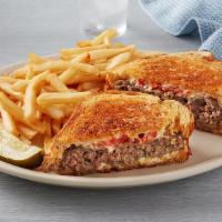 Patty Melt · Eight-ounce charbroiled chopped steak with swiss cheese, grilled onions and tomatoes on gril...