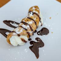 Chocolate Dipped Cannoli · Tube-shaped shells of fried pastry dough with sweetened ricotta cheese & chocolate chip crea...