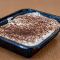  Tiramisu · The classic Italian dessert. A layer of creamy custard atop espresso-soaked ladyfingers.