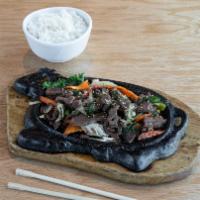 Bulgogi · Korean dish of thin beef slices marinated and grilled on a barbecue.

Choice of Steam rice o...