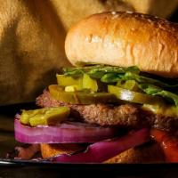 The Spicy Hot Burger · Delicious homemade Beef patty served on a toasted bun with Pepper jack cheese, jalapeños, le...