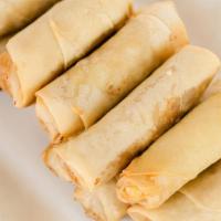 Spring Roll · Cabbage, onions, carrots fried in a crispy wrapper.