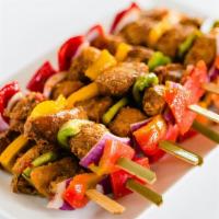 Chicken Kebab  3Ct · Peppered chicken breast chunks on a skewer with peppers and onions.