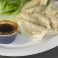 Steamed Dumplings · Steamed - Chicken&Vegetables Dumplings  serve with our Dumplings soy sauce.