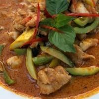 Pa-Nang (Red Curry) · Zucchini, bell peppers in a creamy and spicy coconut milk in red pa-nang sauce.