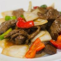 Pepper Steak Stir Fry · Green and red bell peppers, garlic, onions, and black pepper