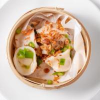 Dumplings · A mixture of ground pork and shrimp; seasoned and steamed, served with house special soy sau...