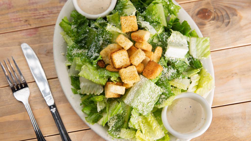 Caesar Salad · A true classic with romaine lettuce, croutons, grated parmesan cheese, and caesar dressing.