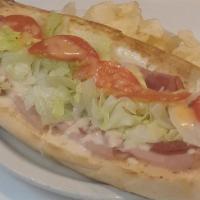 Italian Club Sandwich · Smoked turkey breast, ham and pepperoni, with lettuce, tomatoes, mozzarella cheese and cream...