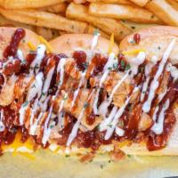 Bbq Bacon Ranch Chicken Dog W/Fries · BBQ and ranch sauce, bacon, Cheddar cheese with chicken.