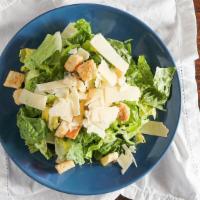 Classic Caesar Salad · Tender hearts of romaine tossed with our special Caesar dressing and finished with romano, P...