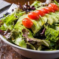 Avocado Salad · Mixed greens, fresh-cut avocados, grape tomatoes with olive oil and a sesame dressing.
