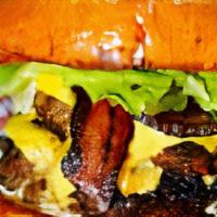 Oak Cliff Burger · Double meat double cheeseburger with bacon. Lettuce, tomato, pickles, onions, with your choi...