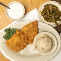 Chicken Fried Chicken Breast · 8 oz. Boneless Chicken Breast fried to perfection. Served with cream gravy, salad and french...
