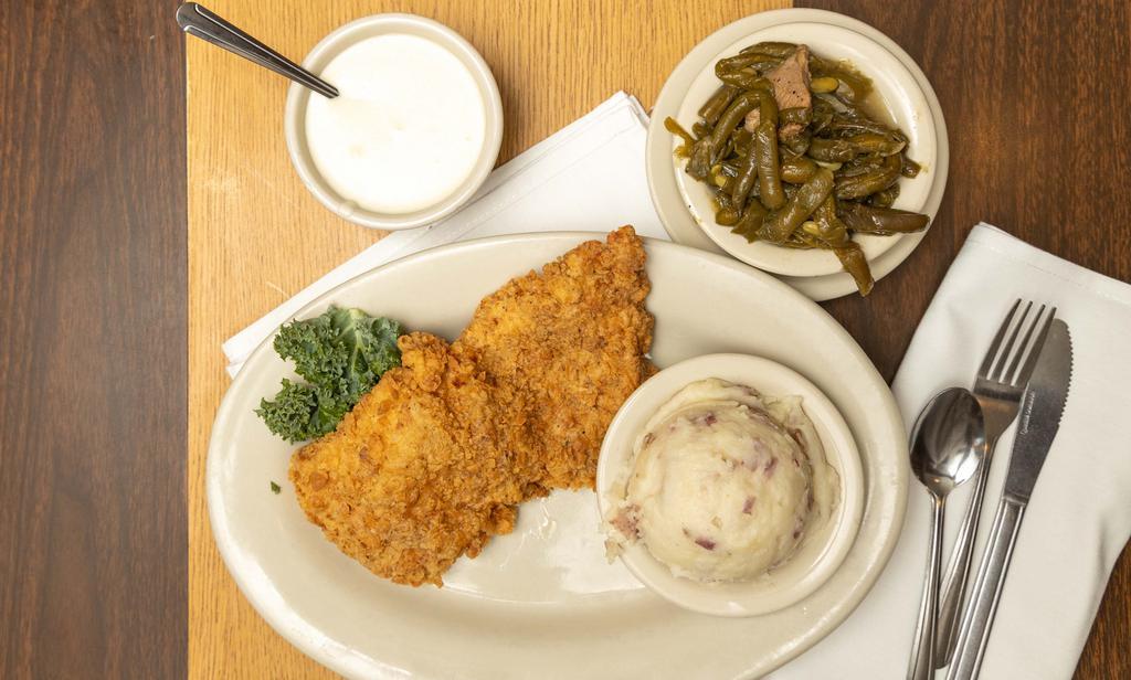 Chicken Fried Chicken Breast · 8 oz. Boneless Chicken Breast fried to perfection. Served with cream gravy, salad and french fries or mashed potatoes and green beans.