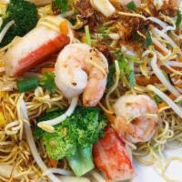 Seafood Stir Fried Egg Noodle · Stir-fried with egg noodle, carrot, bean sprout, broccoli and shrimp, squid and imitation cr...