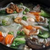 Vegetable Soup · Served with crispy noodles.