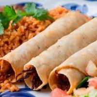 Flautas · Three corn tortillas filled with shredded chicken, rolled and deep fried, served with rice, ...