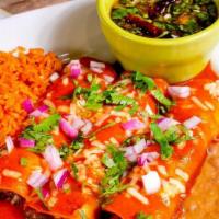 Birria Enchiladas · Three enchiladas covered with birria gravy and cheese. Served with rice, beans and sliced av...