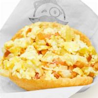 Perico Arepa · Vegetarian. Scrambled eggs with tomato and onions.