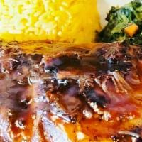 Jerk Bbq Ribs · Grilled Baby Back Ribs, marinated in Jerk spices, then seasoned with our signature jerk hone...
