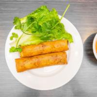Fried Egg Roll · Carrot, Taro, and vermicelli noodles folded into an egg-free wrap that is fried to a golden ...