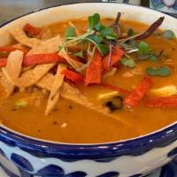 Tortilla Soup · Shredded chicken on a tangy chicken broth, topped with avocado, tortilla strips and Oaxaca c...
