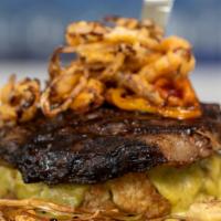Mexican Country Rib-Eye · A tender 12 oz gill Rib-Eye, on a bed of grill cauliflower covered in a creamy poblano sauce...