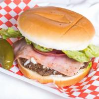 La Monterrey Burger · Jumbo hamburger bun, mayonnaise, mustard, tomato, lettuce, avocado, homemade patty, melted w...
